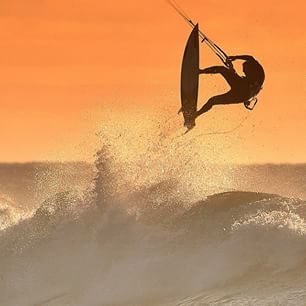  Rider Nuno "Stru" Figueiredo nabs a spectacular end-of-day surf session. #Portugal (Photo by Joaquim Oliveira) 
